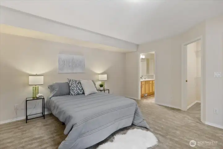 Primary bedroom looking in! Love the set in wall there with some architectural interest!