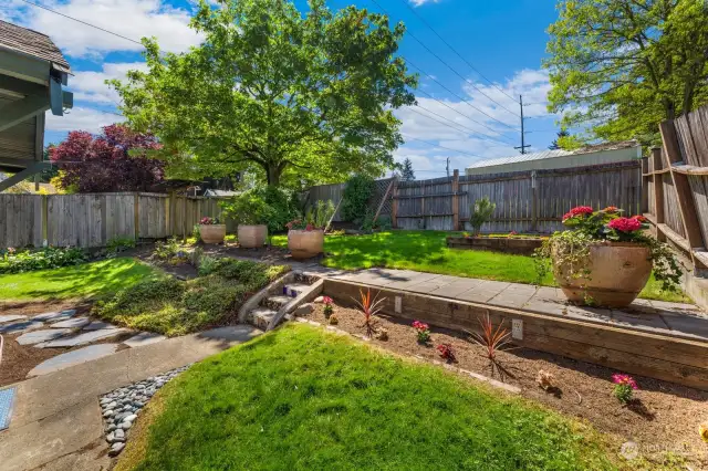 Beautifully landscaped and terraced backyard