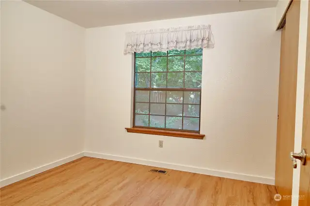 Window on first bedroom gives ample lighting and quiet view of the backyard privacy,