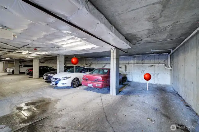 Parking spaces 6 and 8 are marked with red balls