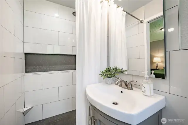 Primary bedroom's 3/4 bathroom - newly remodeled