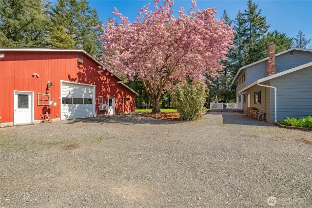 Stick-built shop is fully insulated and drywalled with 2 heat sources, ductless mini-split and a wood stove