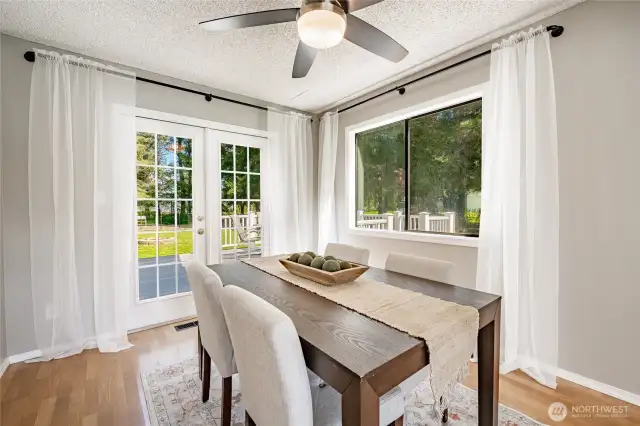 Dining Room with French doors that lead to deck