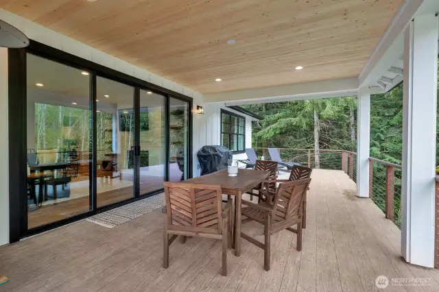 Imagine a spacious, covered deck extending your living space outdoors, providing a comfortable haven regardless of the weather. Plumbed for gas for outdoor grill.