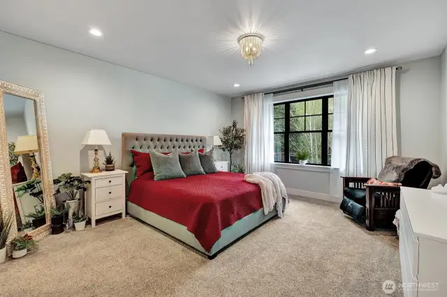 This generous space offers ample room for a king-sized bed, a cozy reading nook, or even a seating area to fully appreciate the calming vista. It's more than just a bedroom; it's a private haven where you can unwind and connect with the serenity of nature.