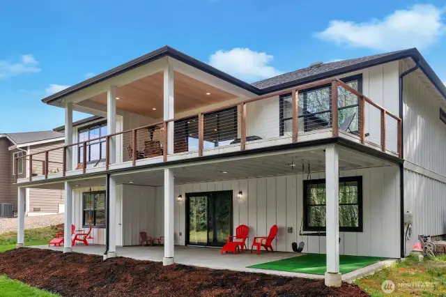 From the street, this charming home offers an inviting first impression, but don't let that fool you. Views from the back show the real story.