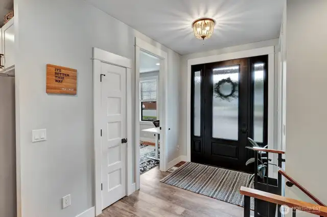 Front entry opens to a spacious open floor concept.