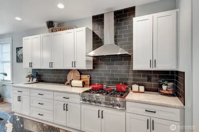 ZLINE 6 Burner Gas Range, surround by Tessuto Carbone, Italian 4x12 Porcelain Matte Etched Subway tile backsplash.