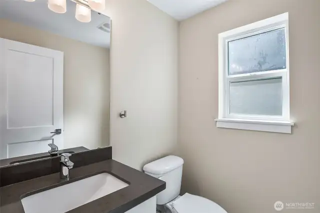 Powder room and laundry room on main floor.