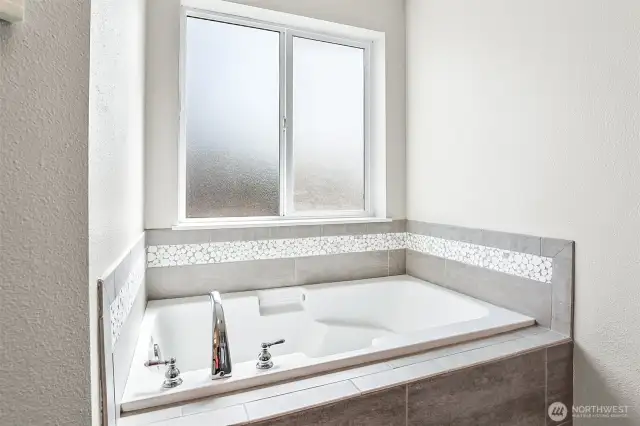 New tile at the tub surround.