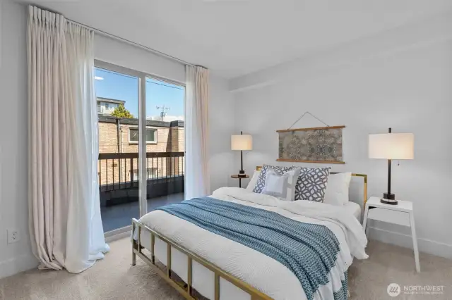 Spacious bedroom with a slider to another deck!