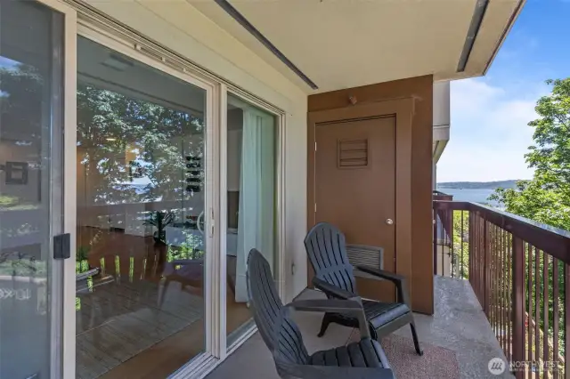 Deck off living room with storage