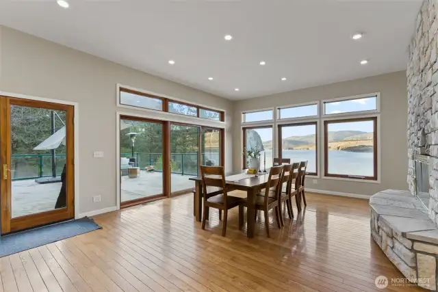 Dining with triple doors to patio