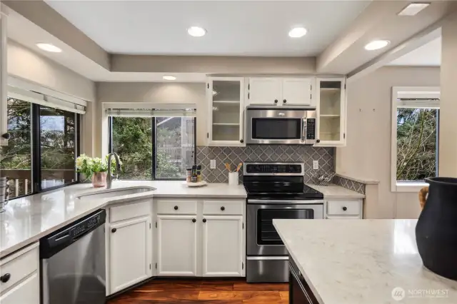 Beautifully updated kitchen with an eating bar.