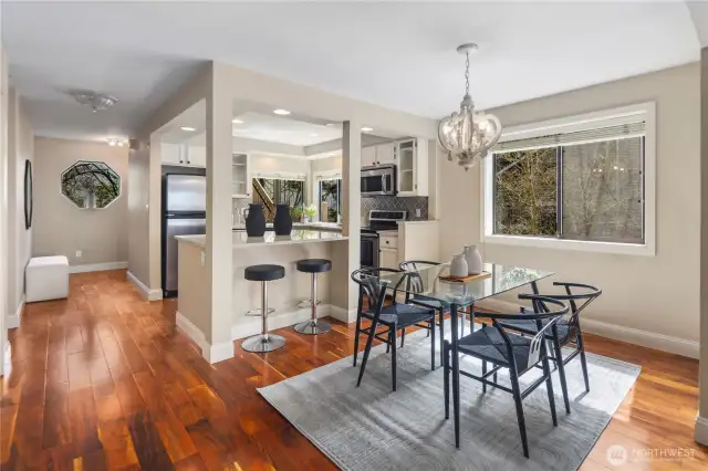 The dining room is accented by a window to let in the natural light.