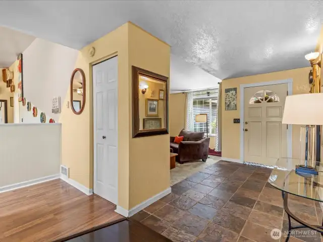 The front entry area showing the hall into the kitchen.