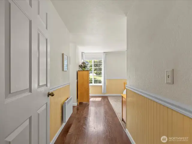 Now to the other side of the home, to the bedroom wing.  This is the entry into the primary bedroom.