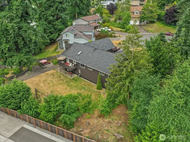 Aerial view of the backside of the home.  It's a very large parcel of land!  Lavender, Rosemary and Raspberries abound.