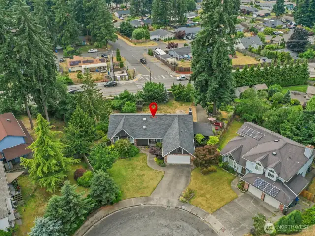 Aerial view of the front of the home showing it's location amid the cul-de-sac.  Great location close to dining, shopping, South Hill Mall, Sounder train for commuting to Seattle.  Walking and biking trails abound nearby.