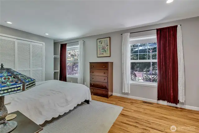 Large main bedroom has closet at both ends of the room