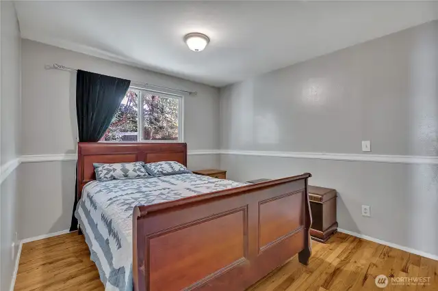 This bedroom faces the backyard