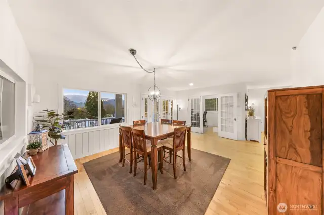 The large and open dining room is open and airy with incredible views to the east.