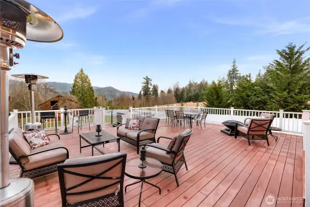 This deck is designed for multiple gathering areas from the firepit, to the outdoor living room. Or if you prefer take a seat at the bistro table in the overlook area. There is still ample space for a large patio table.