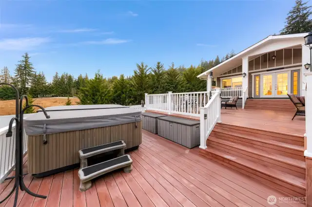 The third level of the deck is larger than most and is the perfect place to unwind and relax in your Jacuzzi tub, also included with the home.