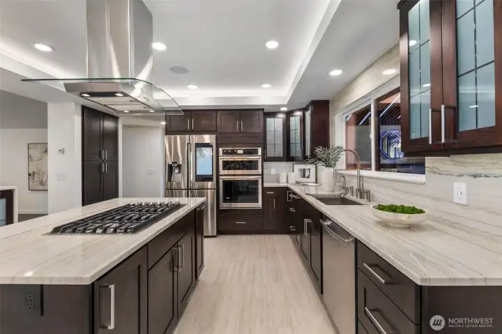 Generous storage runs from the ceiling to the floor, where radiant porcelain tile warms you underfoot.