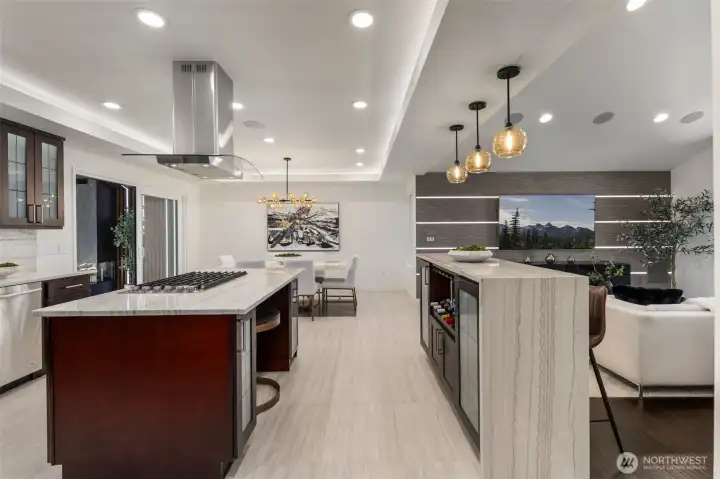 From prep to pour, this kitchen delivers with a beverage cooler in the island, wine storage at the waterfall bar, and space for everything in between.