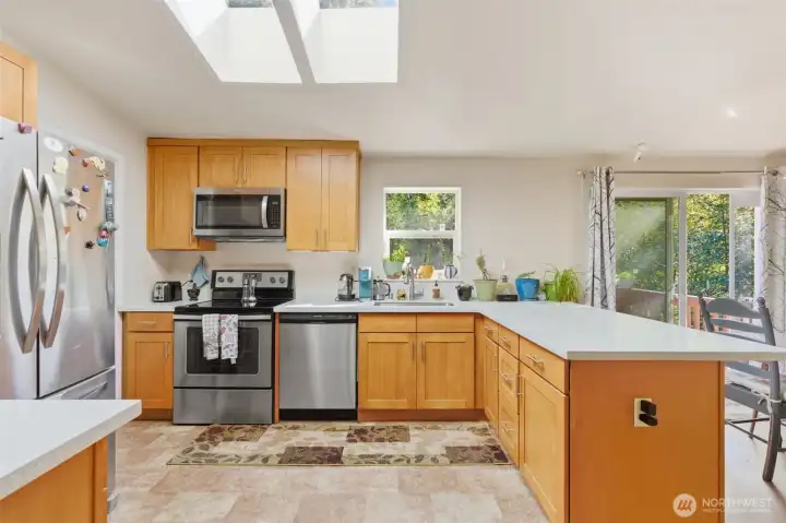 Stainless steel appliances and ample cabinet space