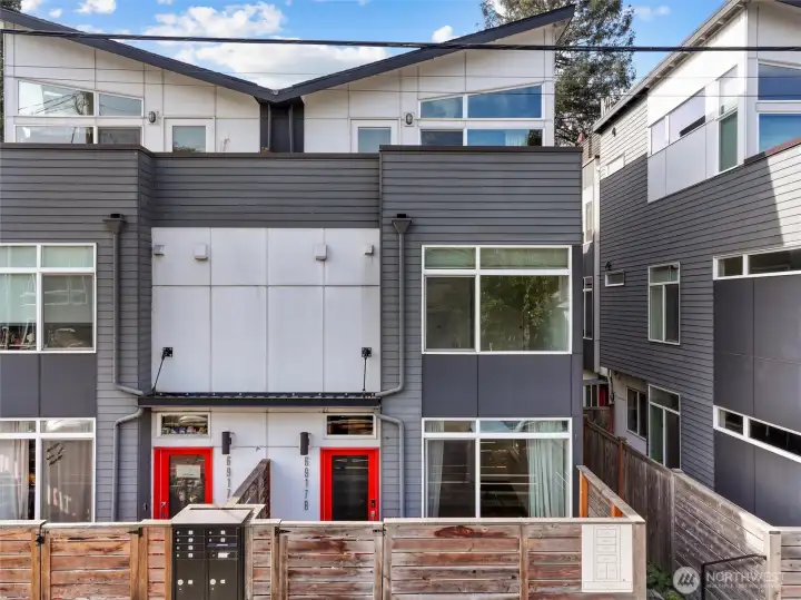 Front of house, unit on the right.