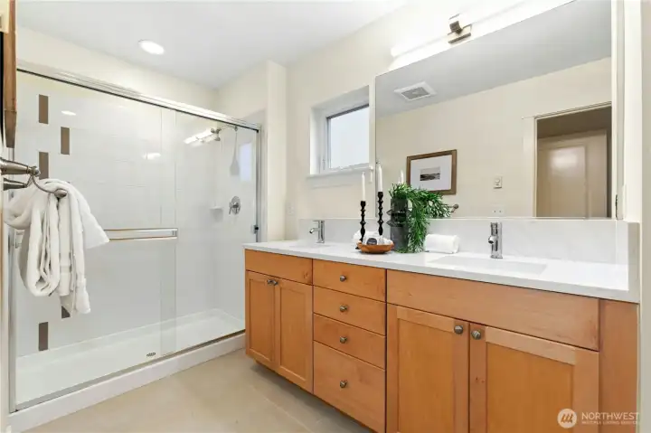 Dual sinks, new quartz counters, and large shower
