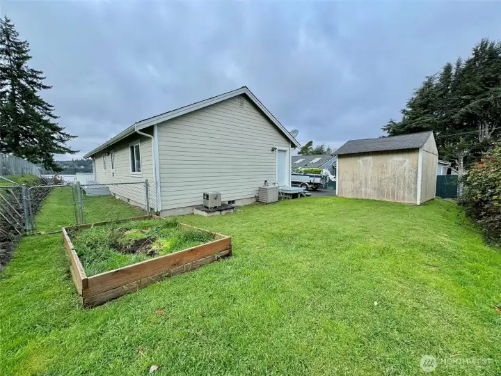 Dog run - private garden space is ready for your personal touch.