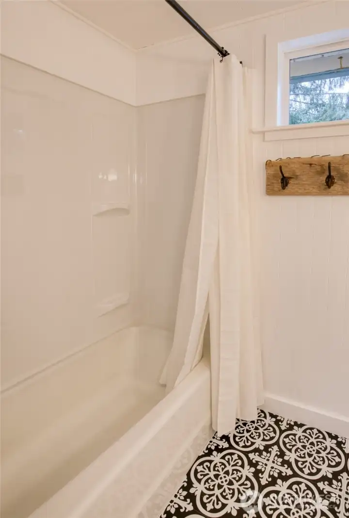 New bathtub surround, faucets and rain shower head