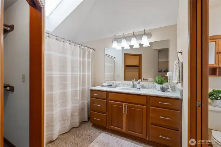 The skylight keeps in light and bright year round.