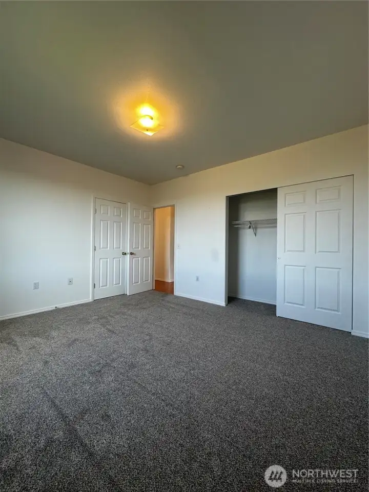 Primary Bedroom With En-Suite Bathroom And 2 Large Closets