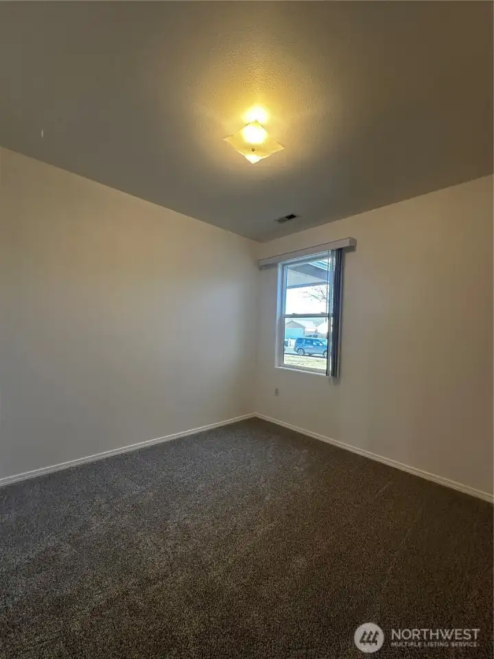 Another View Of the Third Bedroom With Freshly Cleaned Carpeting And fresh Paint. this Home Is Truly Move-In Ready for You Today!