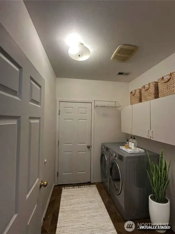 Mudroom With Garage Access & Laundry Area