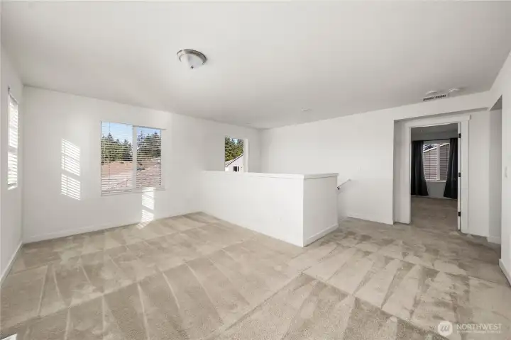 At top of stairs, to the left is open space for activities