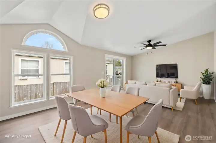 Dining area and additional living space off of the kitchen (Virtually Staged)