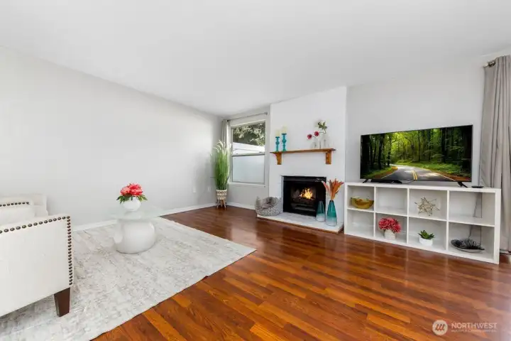 Open floorplan & cozy wood burning fireplace
