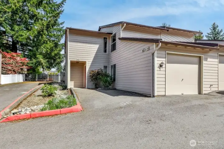 Dedicated parking right in front + attached garage. Guest parking right across from unit.