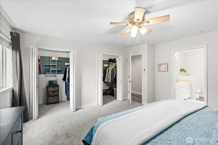 Main floor primary bedroom with ensuite and double walk in closet systems