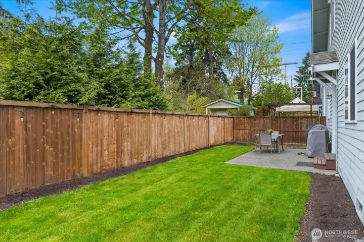 Private, fully fenced backyard