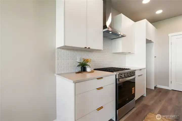 Kitchen includes a stainless appliance packet. Includes a fridge which isn't pictured