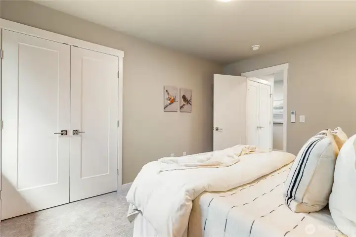 Upstairs bedroom #3 with French door to closet
