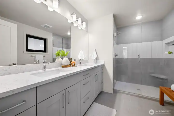 Modern bathroom featuring spacious walk-in shower