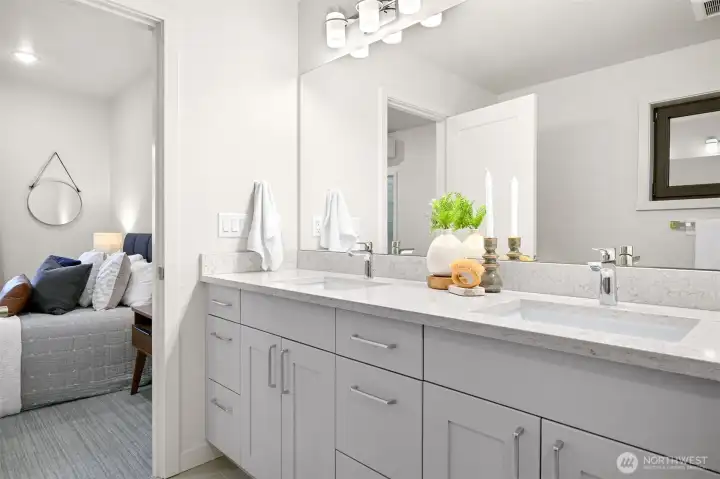 Beautiful ensuite bath seamlessly connected to the primary bedroom