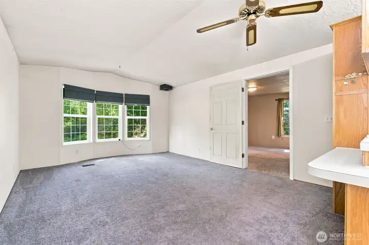 Living Room located off the kitchen. Living Room located off the kitchen.